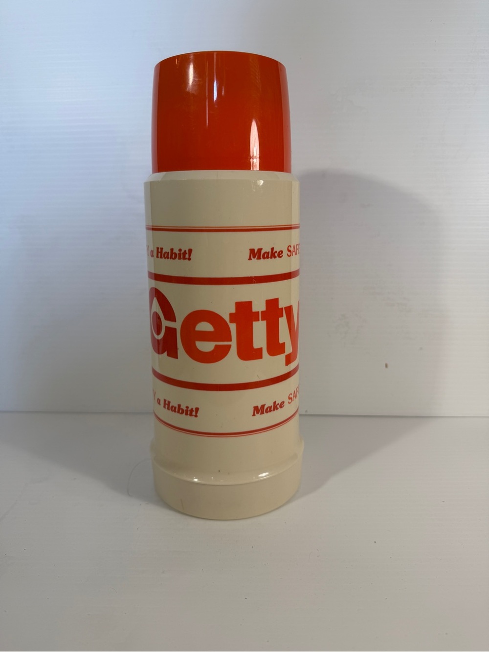 Thermos Cream Bottle with Orange Cap and Logo Bands